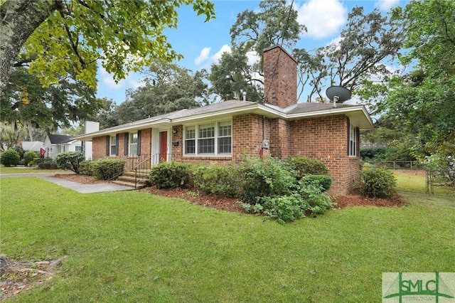 ranch-style home with a front yard