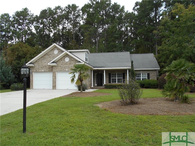 view of front facade featuring a garage and a front yard