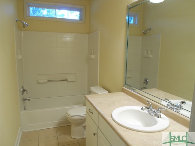 full bathroom with toilet, vanity, tile patterned flooring, and shower / washtub combination