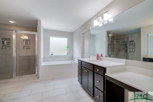 bathroom featuring vanity and plus walk in shower