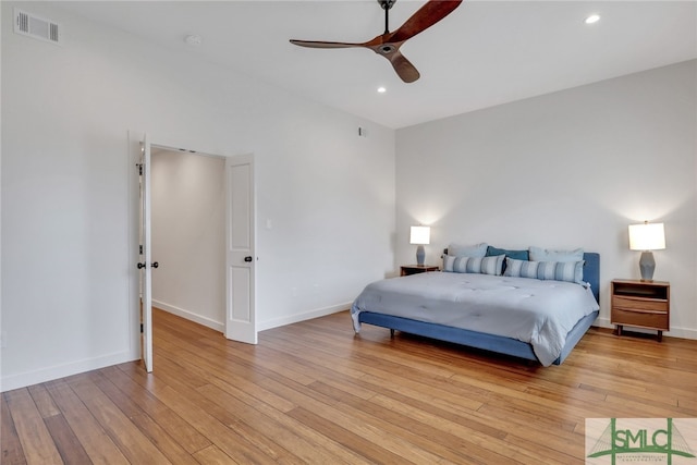 bedroom featuring light hardwood / wood-style floors and ceiling fan