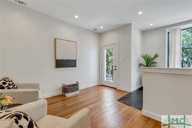 living room with hardwood / wood-style flooring