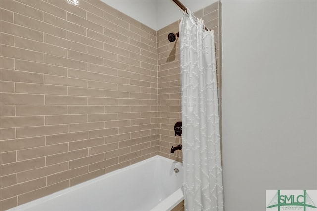 bathroom featuring shower / tub combo with curtain