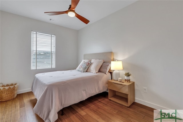 bedroom featuring light wood-type flooring and ceiling fan