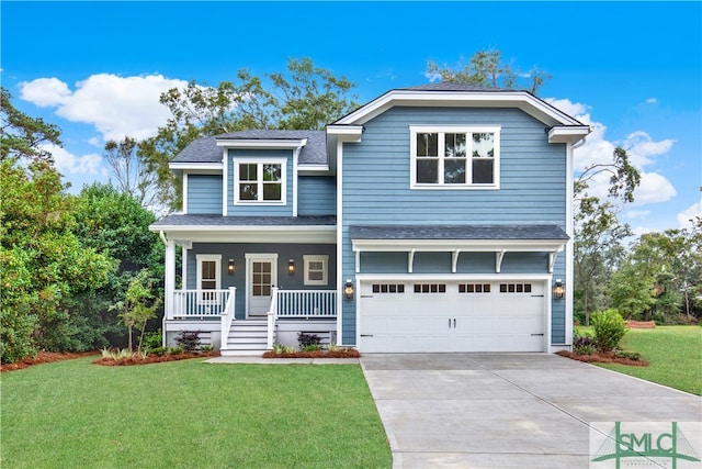 view of front of home featuring a garage, a front yard, and covered porch