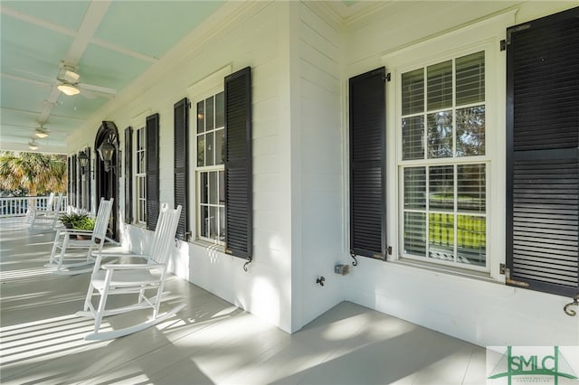 view of patio / terrace with a porch and ceiling fan