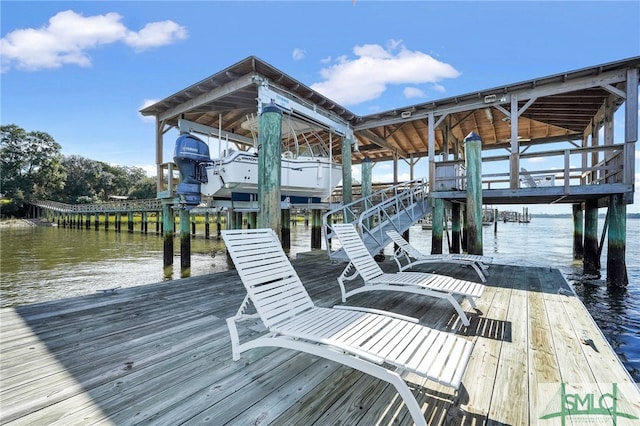 dock area featuring a water view