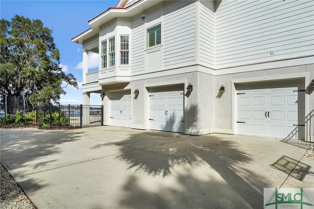 view of property exterior with a garage