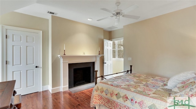 bedroom featuring ceiling fan and wood-type flooring