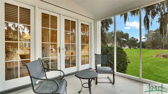 sunroom / solarium with french doors and vaulted ceiling