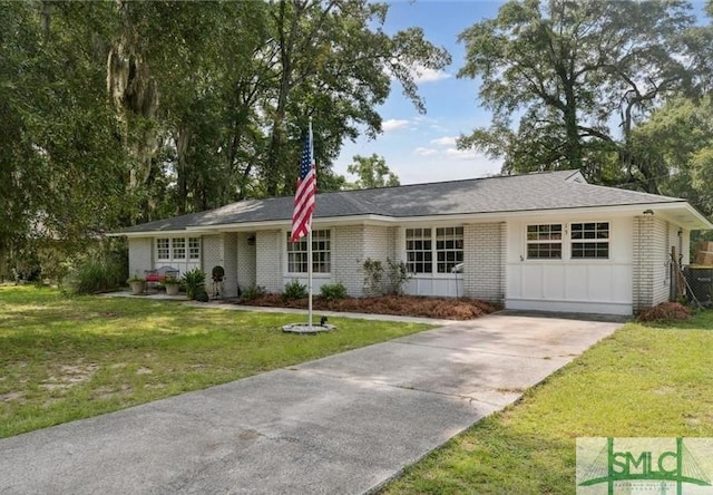 ranch-style house with a front lawn