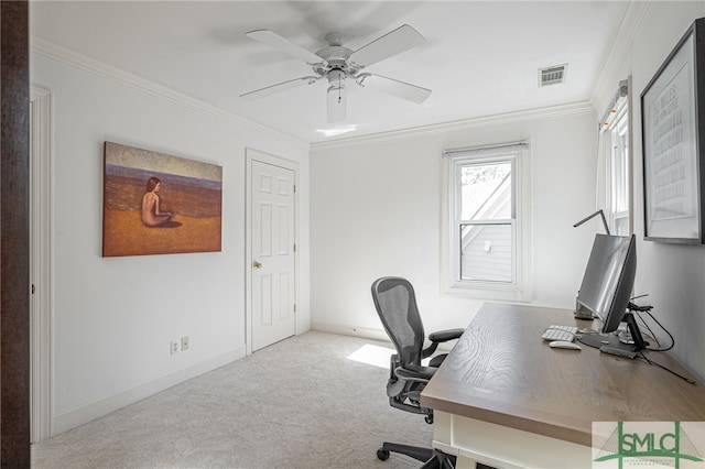 home office with ceiling fan, light colored carpet, and ornamental molding