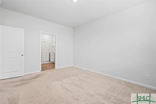 unfurnished bedroom with carpet