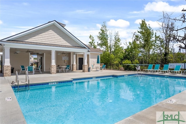 view of pool featuring ceiling fan and a patio