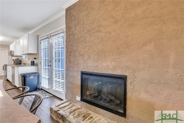 interior space with crown molding, french doors, and dark hardwood / wood-style floors