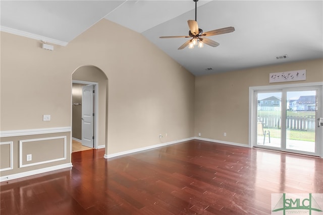 unfurnished room with lofted ceiling, ceiling fan, crown molding, and wood-type flooring