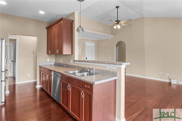 kitchen with stainless steel appliances, dark hardwood / wood-style flooring, hanging light fixtures, sink, and vaulted ceiling