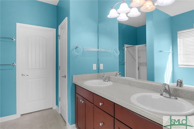 bathroom with vanity, tile patterned floors, and an enclosed shower