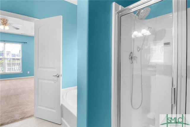 bathroom featuring shower with separate bathtub, ceiling fan, and tile patterned floors