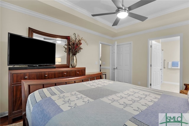 bedroom featuring ensuite bathroom, ceiling fan, and crown molding