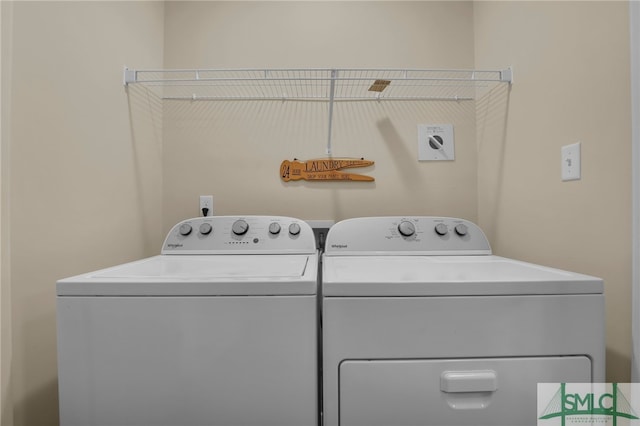 laundry room featuring independent washer and dryer