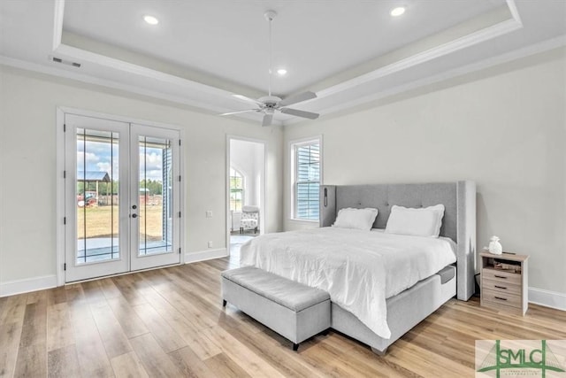 1495 Lillie Hagan Rd, Brooklet, GA 30415 - bedroom with a raised ceiling, french doors, access to exterior, multiple windows, and crown molding