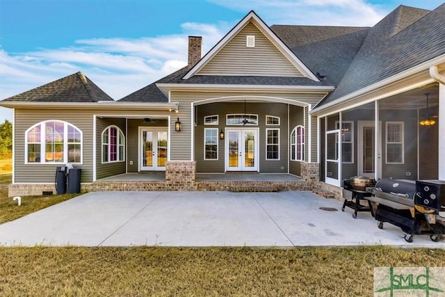 1495 Lillie Hagan Rd, Brooklet, GA 30415 - rear view of property with french doors, a chimney, roof with shingles, and a patio area