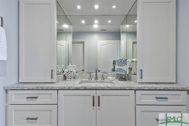 bathroom featuring vanity