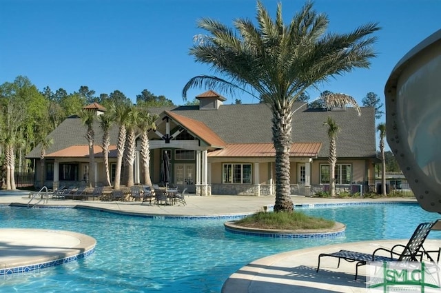 view of pool with a patio area