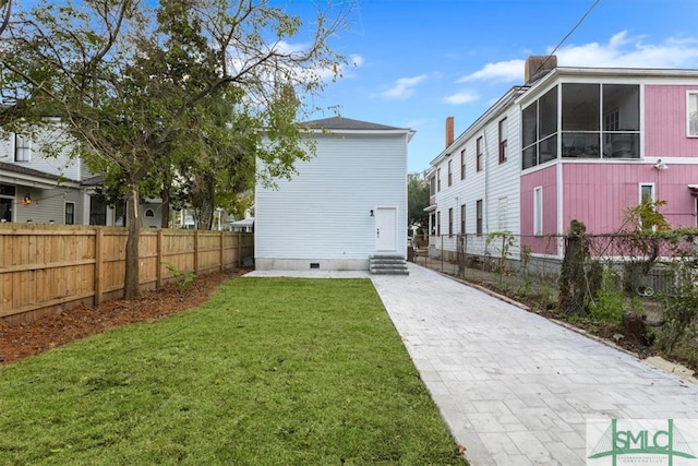 exterior space featuring a lawn