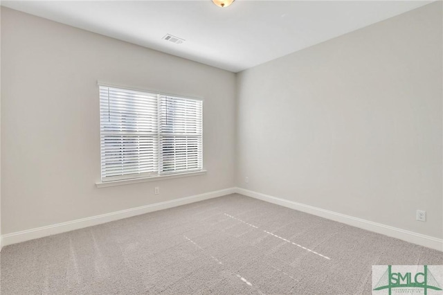 view of carpeted spare room