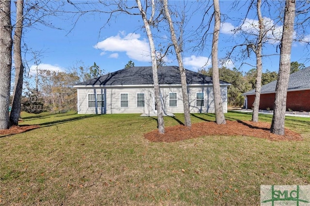 view of front of home with a front yard