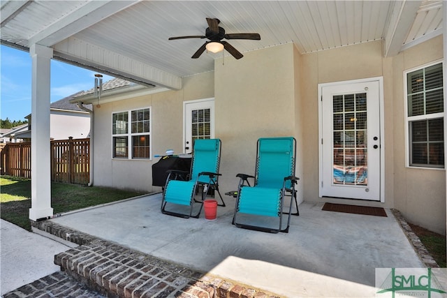 view of patio featuring ceiling fan and area for grilling