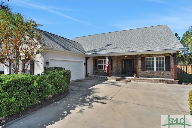 ranch-style house featuring a garage