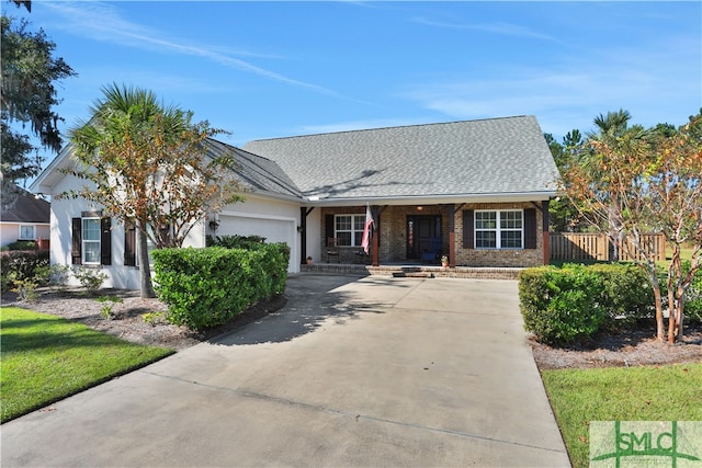 ranch-style home featuring a garage