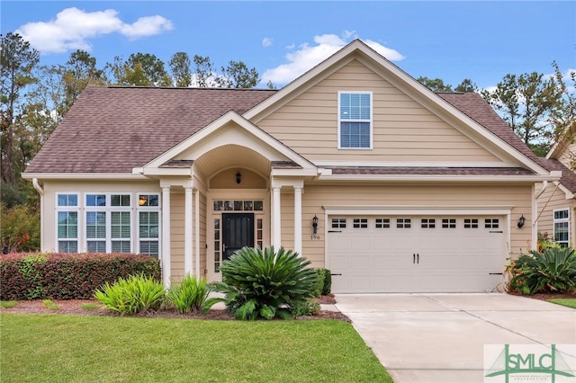 craftsman inspired home with a front lawn