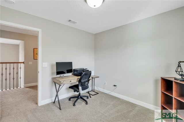 view of carpeted home office