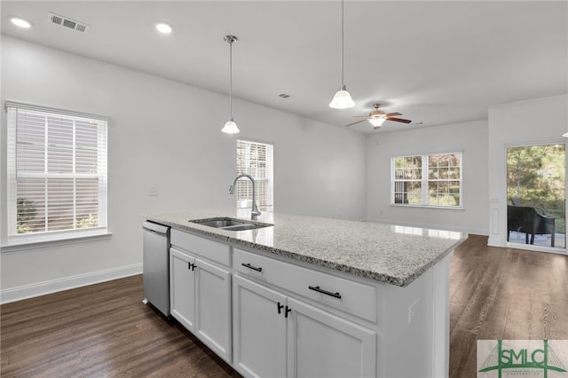 kitchen with dishwasher, white cabinetry, sink, and dark hardwood / wood-style flooring