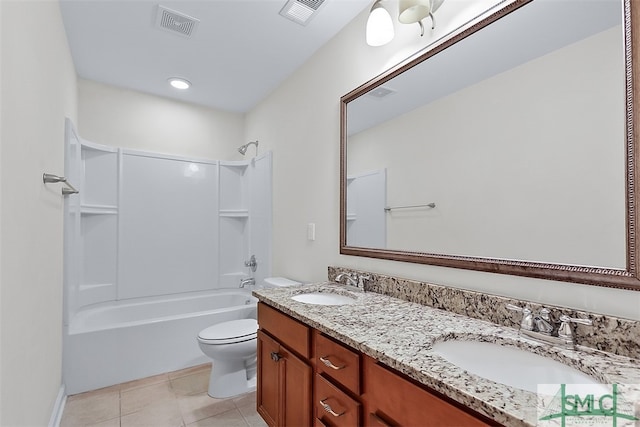 full bathroom featuring toilet, bathtub / shower combination, vanity, and tile patterned flooring