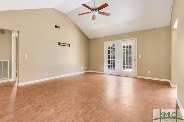 spare room featuring ceiling fan, visible vents, and wood finished floors