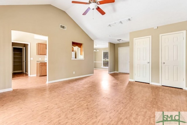 unfurnished living room with light wood-style floors, baseboards, visible vents, and ceiling fan with notable chandelier