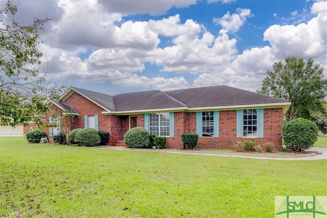 single story home with a front yard