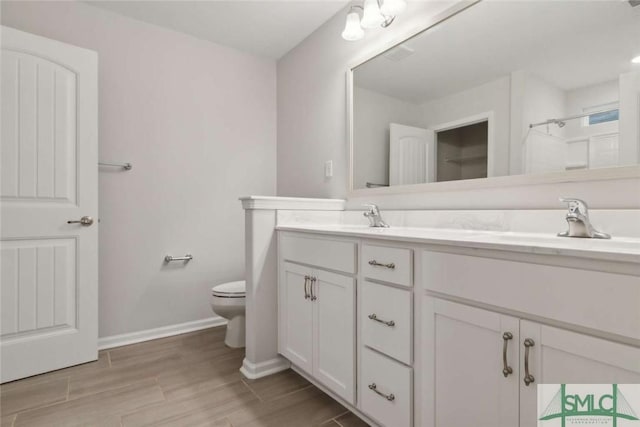 24 Pomona Cir, Savannah, GA 31419 - bathroom featuring double vanity, wood finished floors, and a shower