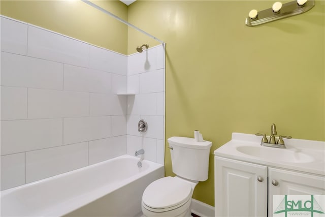 full bathroom featuring vanity, toilet, and tiled shower / bath combo