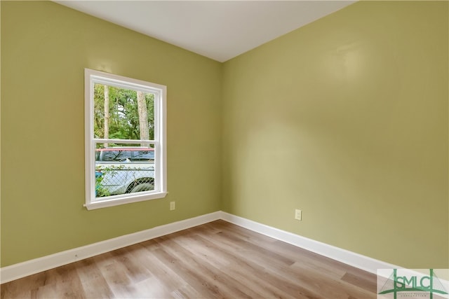 spare room featuring light wood-type flooring