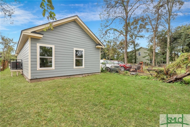 view of property exterior featuring a lawn