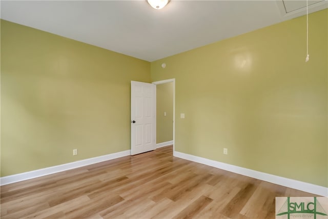 spare room with light hardwood / wood-style floors