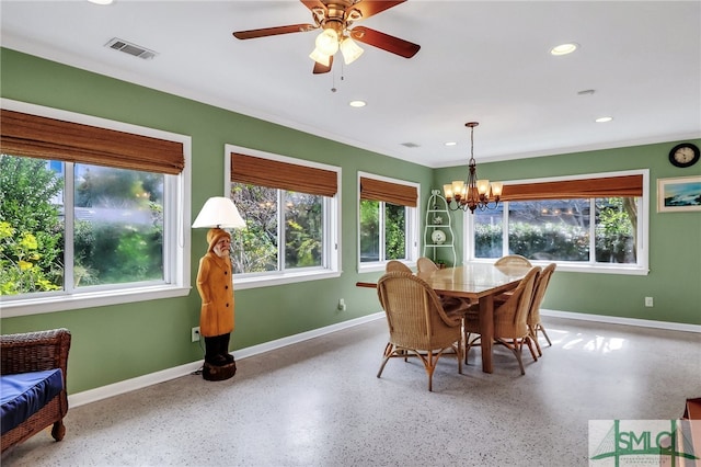 dining room featuring ceiling fan with notable chandelier