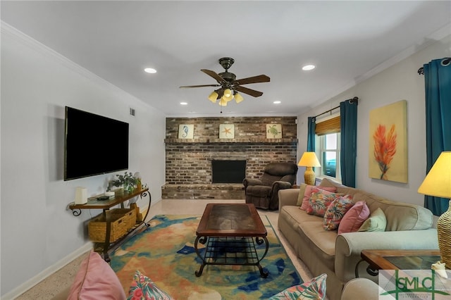 living room featuring ornamental molding, a fireplace, and ceiling fan