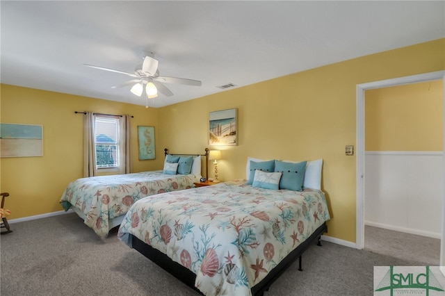 bedroom featuring ceiling fan and carpet floors